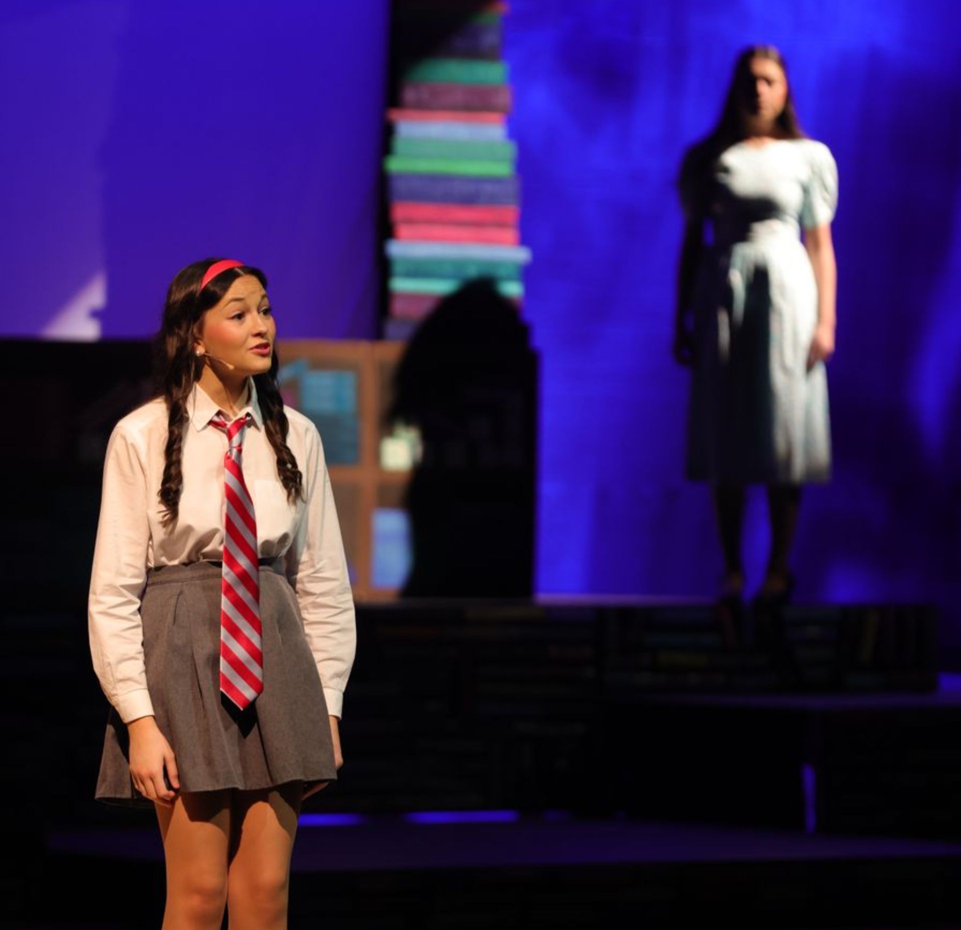 Student performing on stage
