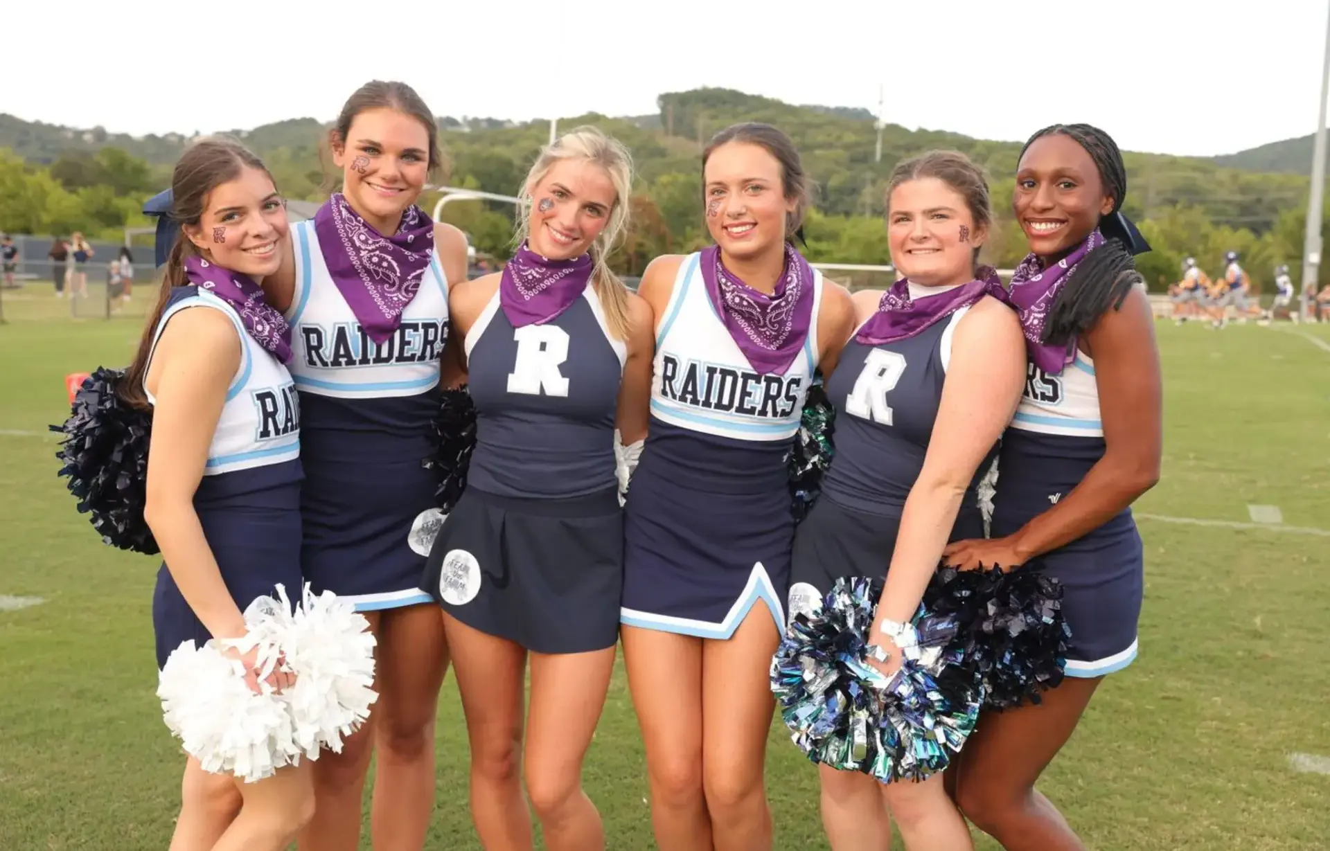 Cheerleading team smiling