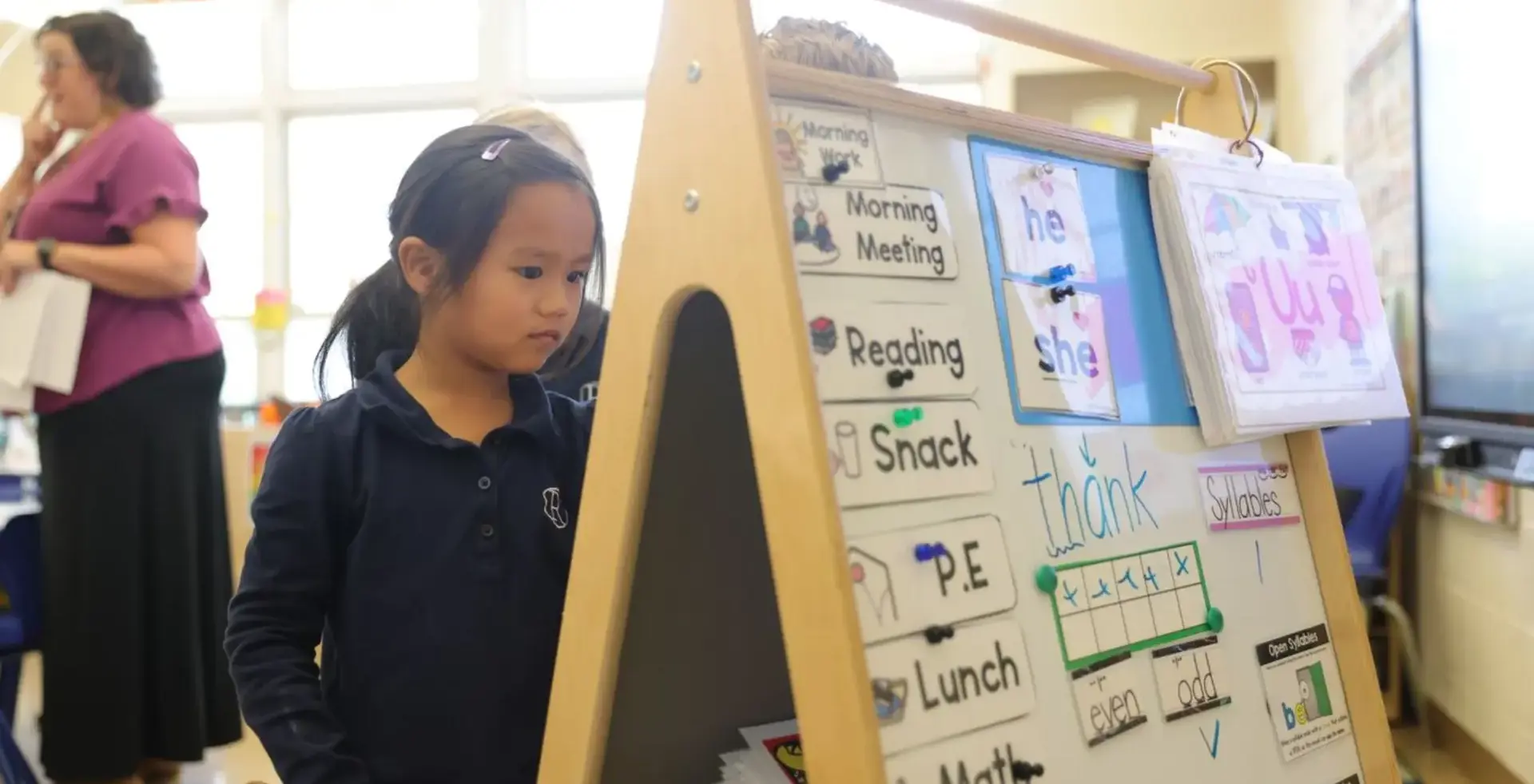 Young student participating in a classroom learning activity.