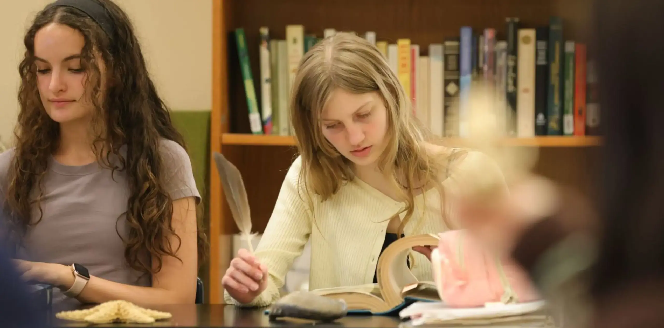 student writing in class