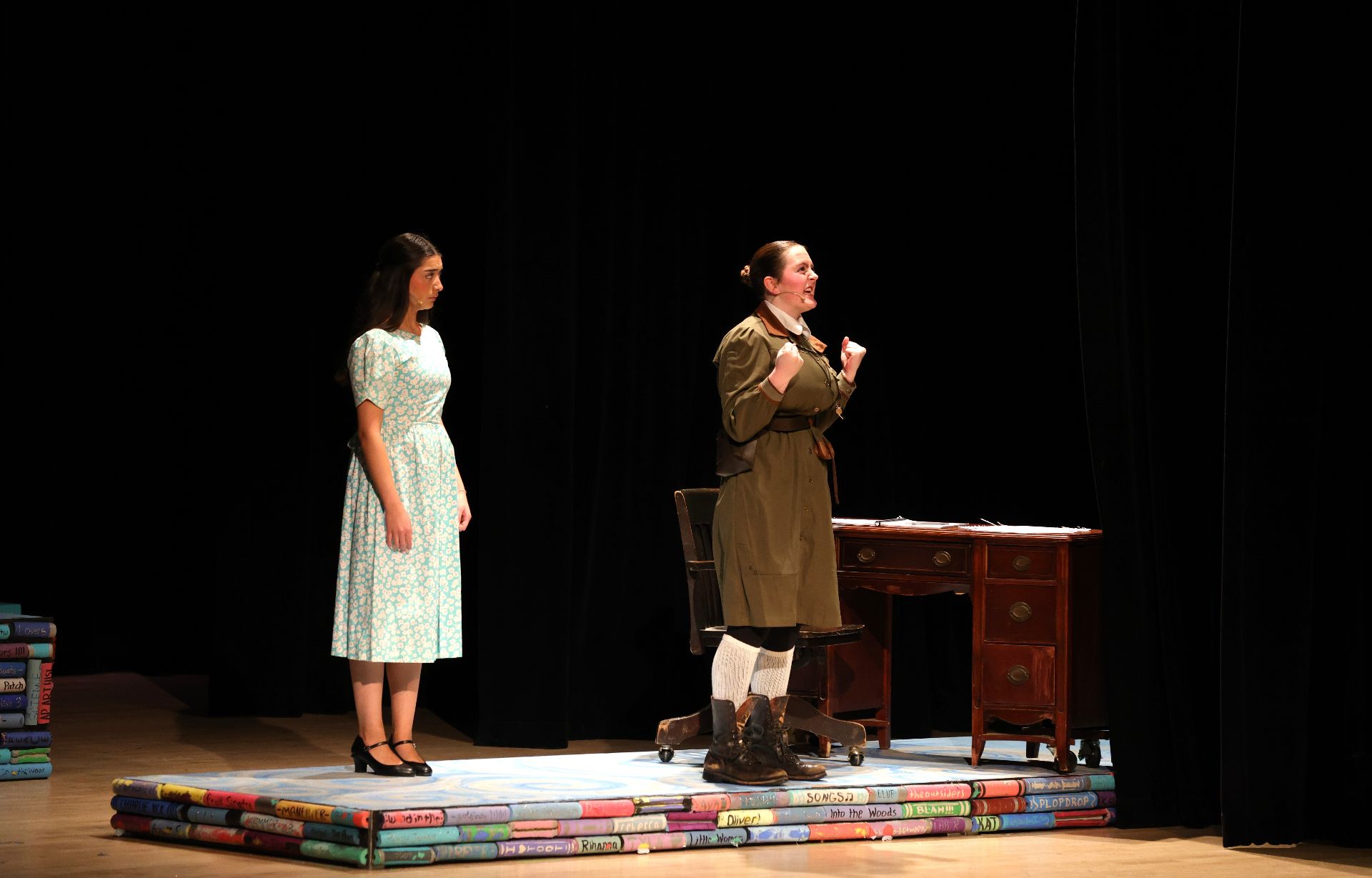 Students performing on stage