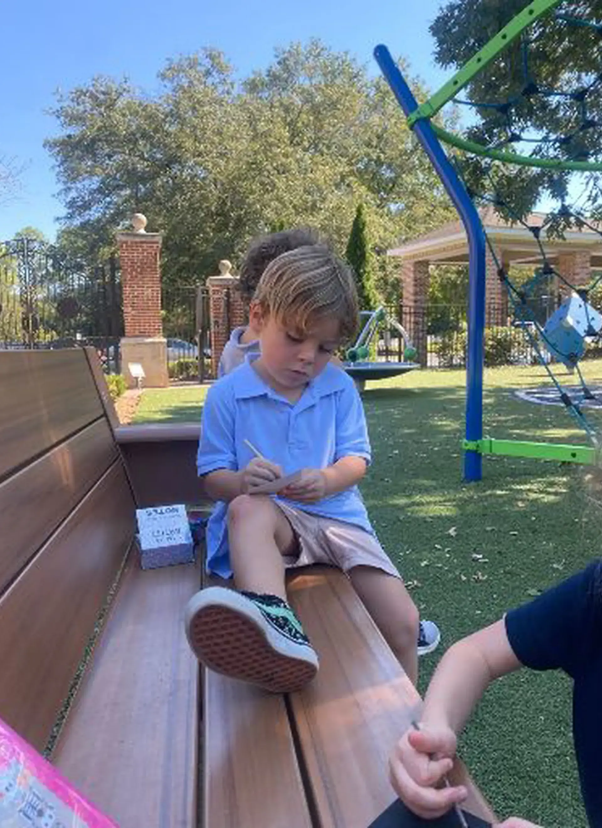 Young Randolph student takes a moment outside to focus on well-being. 