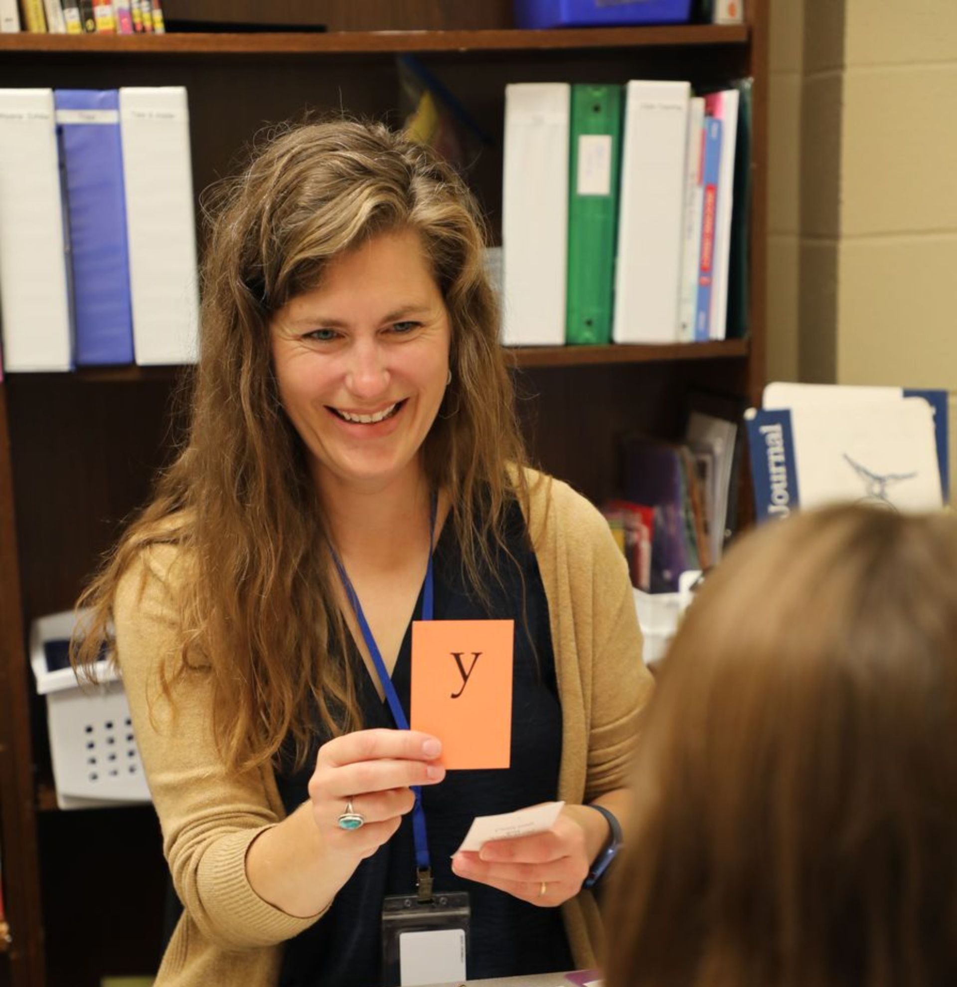 Personalized tutoring session for a student with dyslexia in the classroom.