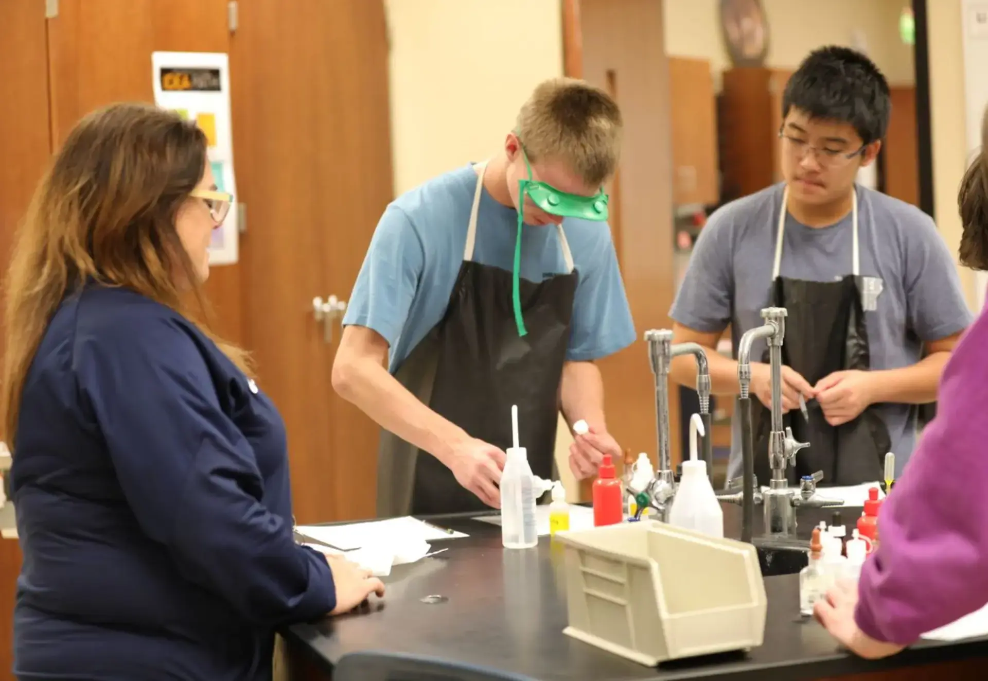 Upper school students engaging in a science activity