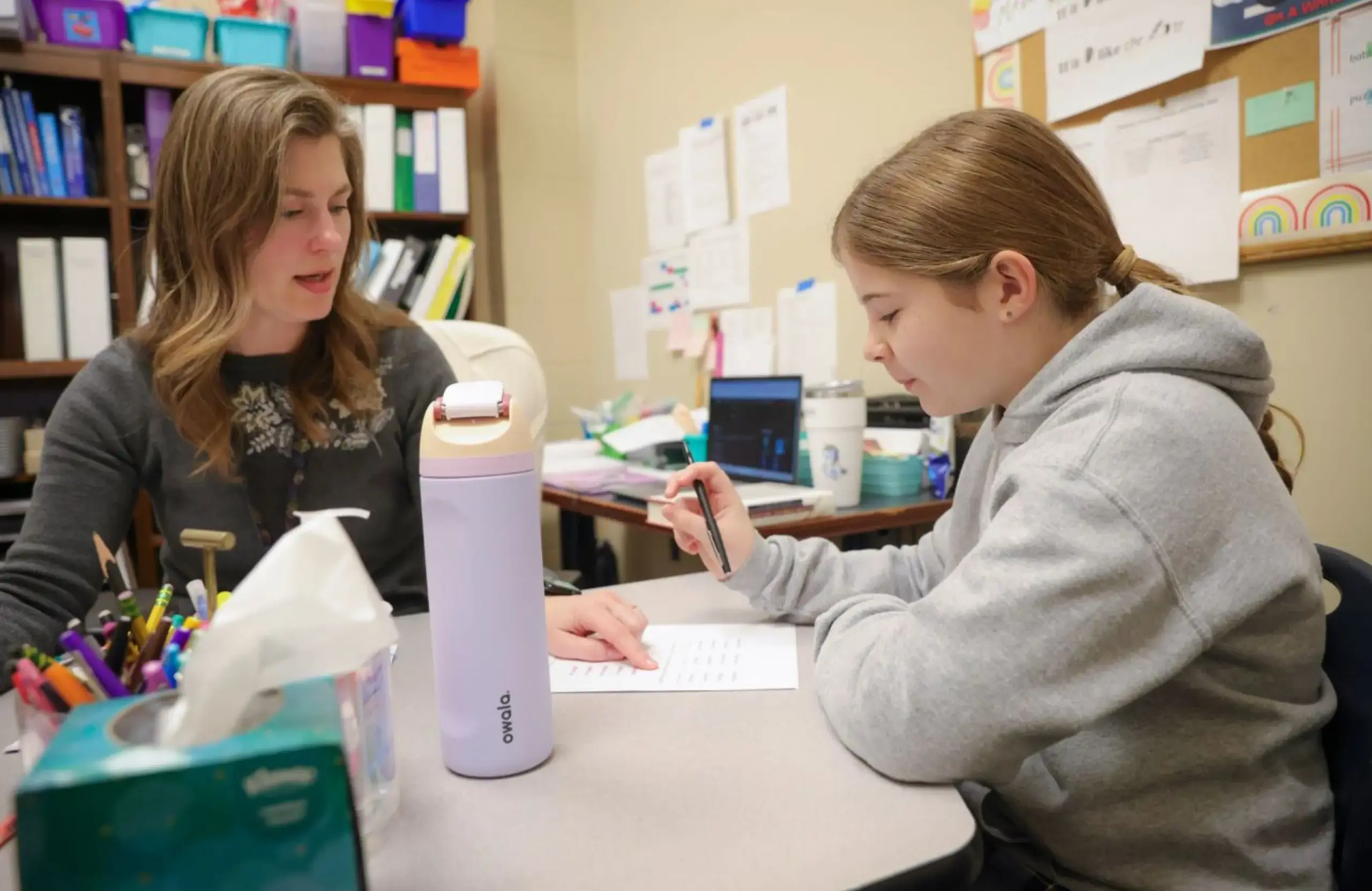 Students build reading and writing skills through multisensory instruction at a dyslexia-focused school.