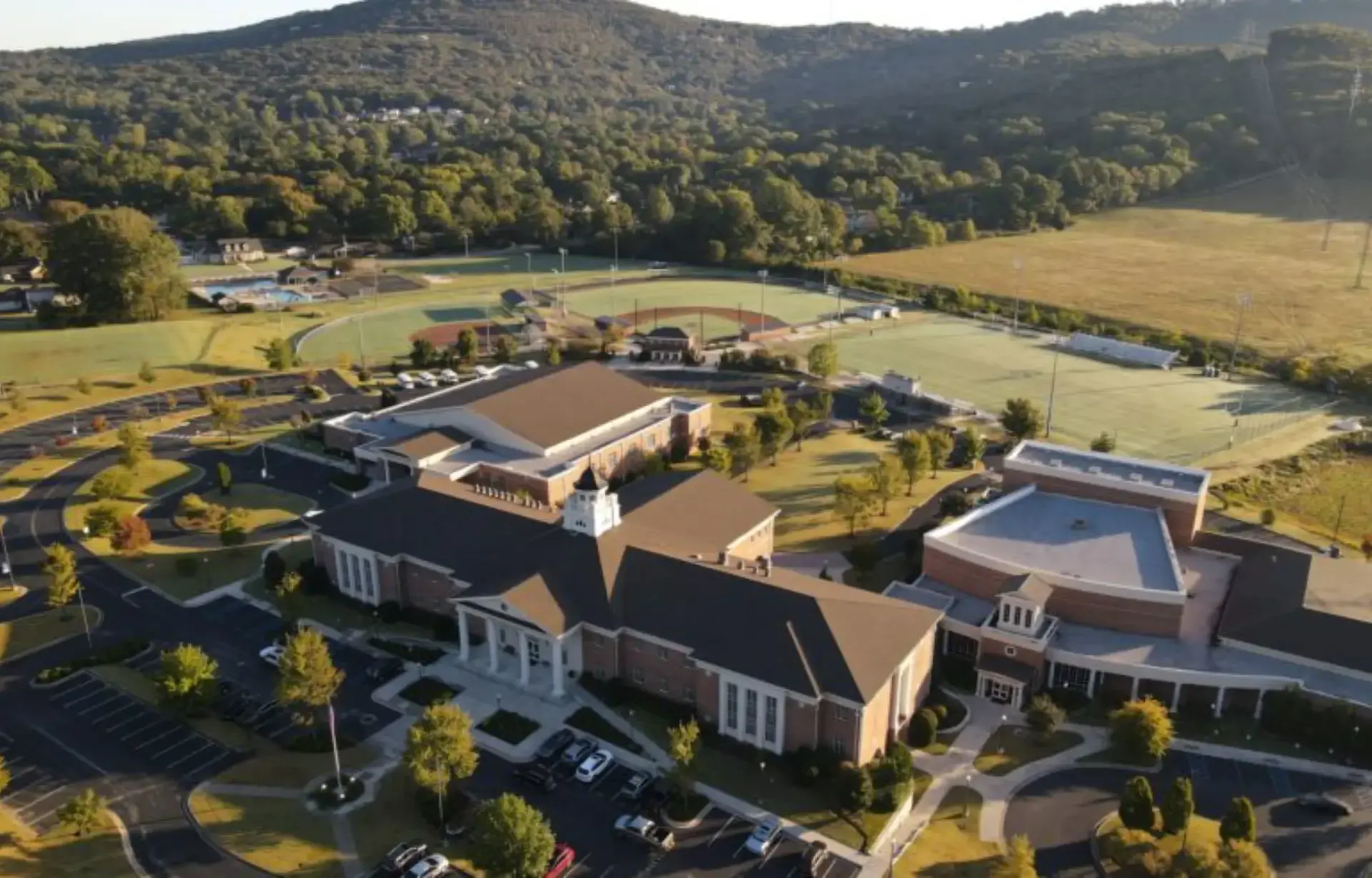 A view of Randolph School’s Garth Campus, showing academic buildings and green outdoor spaces on a bright day.