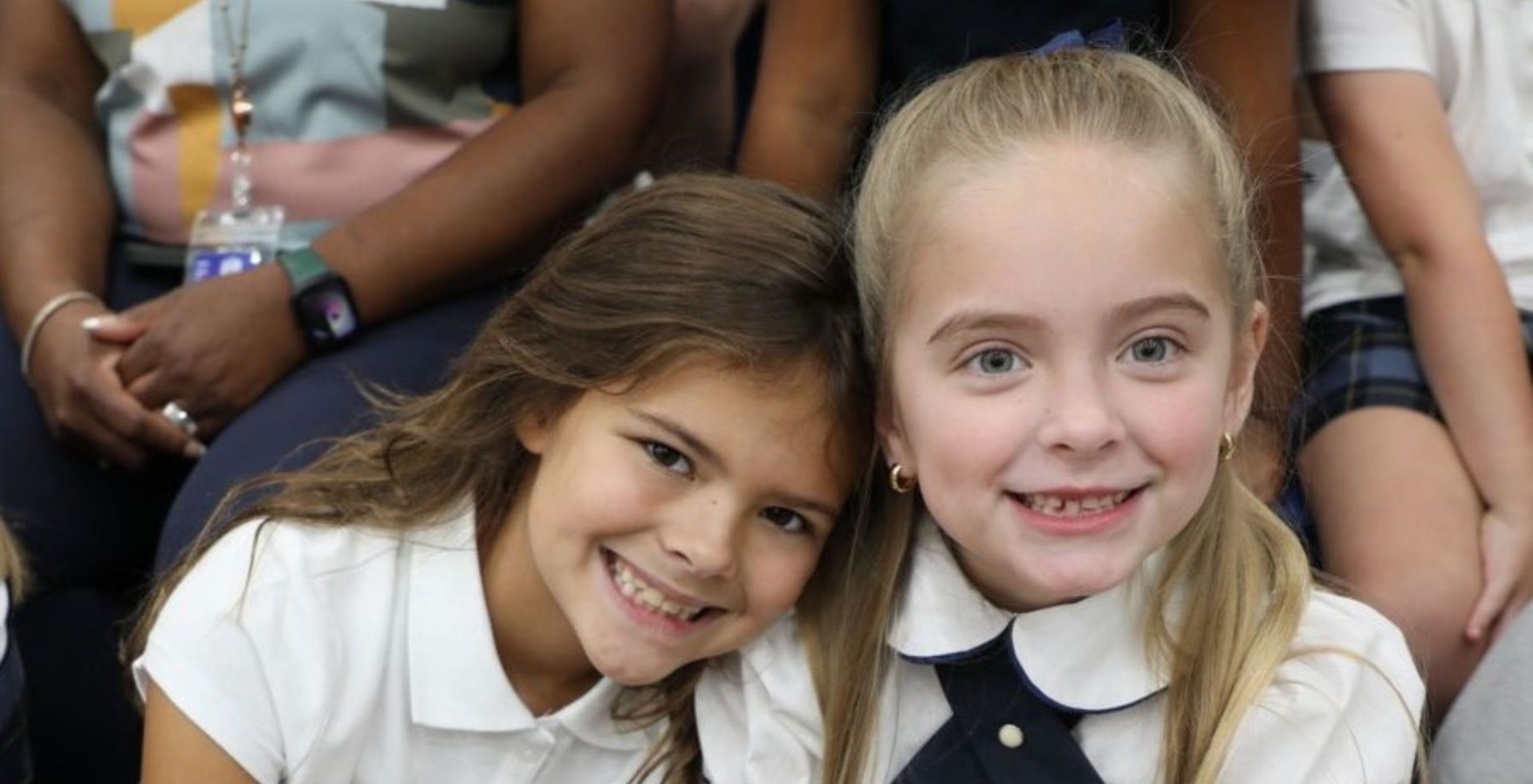 Two students smiling at the camara